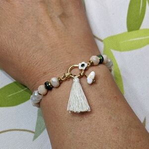 Stretch Bracelet W/ Faceted Beads, Tassel, Little Flower, And Gold-tone Spacers